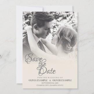 Kissing wedding couple in monochrome announcement