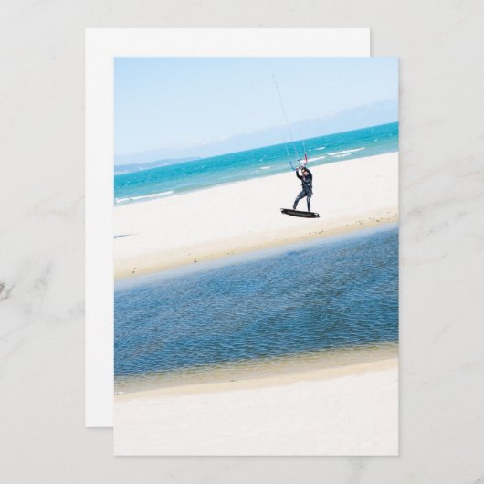 Kitesurfer boosts an air (Front/Back)