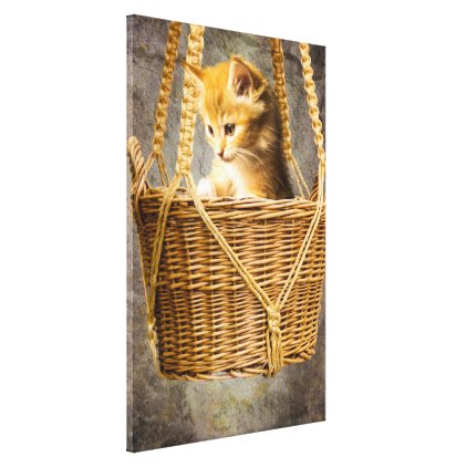 Kitten in basket canvas print