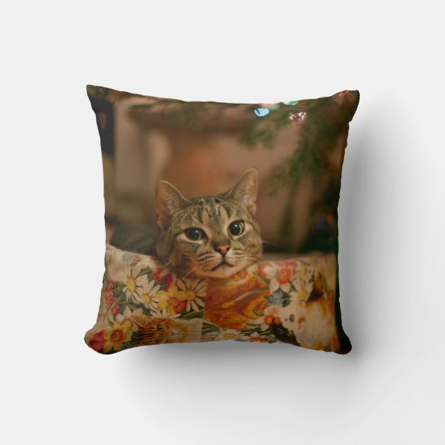 Kitten peeking behind the Christmas tree Throw Pillow (Front)