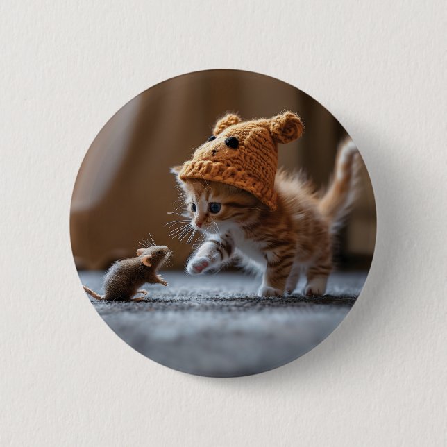 Kitten playing with a small mouse button (Front)