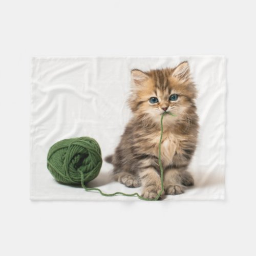 Kitten With Green Yarn Fleece Blanket