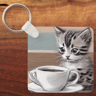 Kitten's Calm Stare at a Cup of Coffee