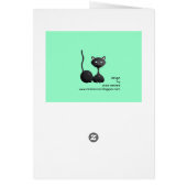 Kitty relaxing on green cards (Back)