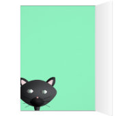 Kitty relaxing on green cards (Inside (Left))
