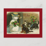 Kitty Trio and Snowman Postcard<br><div class="desc">Cute kittens wearing ribbons approach a big snowman.  Vintage card art for Cat lovers!</div>