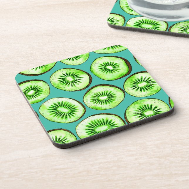 Kiwi slices on turquoise beverage coaster (Left Side)