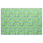 Kiwi slices on turquoise fabric