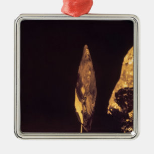 Knapped axe or spear head metal ornament