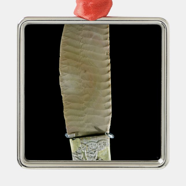 Knife carved with battle scenes metal ornament (Front)