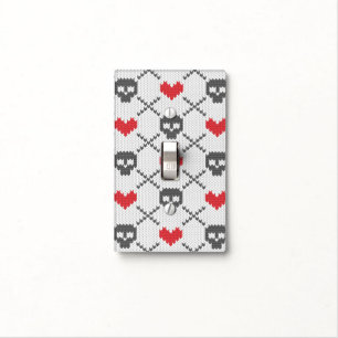 Knitted pattern with skulls light switch cover