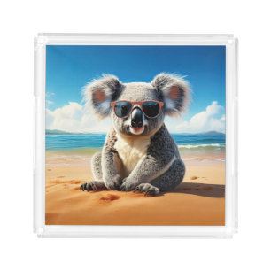 Koala on a sandy beach acrylic tray