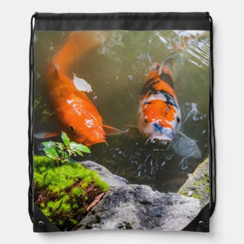 Koi fish in a pond drawstring bag