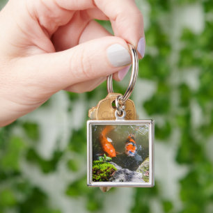 Koi fish in a pond keychain