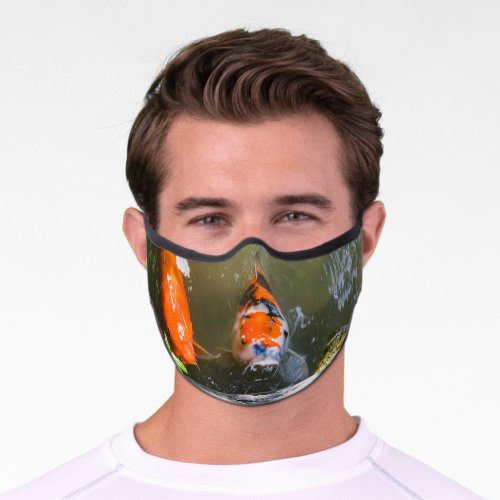 Koi fish in a pond premium face mask