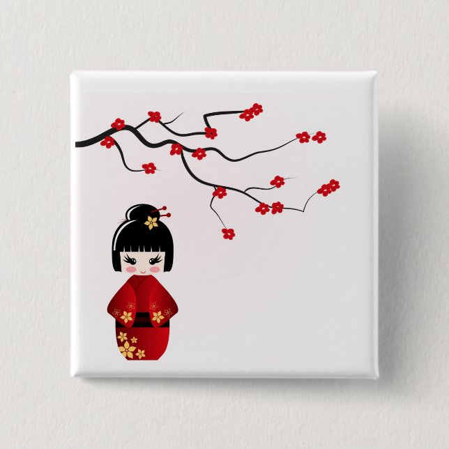 Kokeshi doll under sakura branch pinback button (Front)