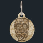 Ku-Tiki Hawaiian Distressed Hibiscus Pet ID Tag<br><div class="desc">Ku, is the god of war. He comes in many shapes and has many expressions. Some fear him, some like to drink with him. This tiki god will add a bit of Hawaiian humor to your life and bring you the spirit of Aloha! Ku is riding on top of a...</div>