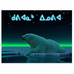 Kuvianak Innovia - Ice Edge Polar Bear Statuette<br><div class="desc">A peaceful moment in the long Arctic night. A Polar Bear rests at the edge of an open area in the pack ice. The Northern Lights glow in the distance; bright stars twinkle overhead. Inuktitut text reading, "Kuvianak Innovia" (ᑯᕕᐊᓇᒃ ᐃᓄᕕᐊ - Merry Christmas), in the syllabic alphabet adopted by the...</div>