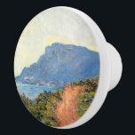La Corniche near Monaco by Claude Monet Ceramic Knob<br><div class="desc">In Monet’s time La Corniche was a narrow mountain track; nowadays, it is the main road between Nice and Monaco. Here the sun is high, the lone walker’s shadow short. Monet’s colors glisten: red, green, blue – everything shimmers in the sunlight. Transfer this image to the product you want. My...</div>