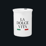 La Dolce Vita Porcelain Pitcher<br><div class="desc">Serve with style and celebrate the art of Italian living with this "La Dolce Vita" porcelain pitcher. Featuring classic black typography and vibrant green and red accents, it adds a touch of sophistication and joy to any meal or gathering. Perfect for water, wine, or fresh juices, this pitcher brings the...</div>