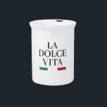 La Dolce Vita Porcelain Pitcher<br><div class="desc">Serve with style and celebrate the art of Italian living with this "La Dolce Vita" porcelain pitcher. Featuring classic black typography and vibrant green and red accents, it adds a touch of sophistication and joy to any meal or gathering. Perfect for water, wine, or fresh juices, this pitcher brings the...</div>