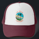 La Jolla California Travel Art Vintage Trucker Hat<br><div class="desc">La Jolla in a vector art style. La Jolla, California, is a coastal gem renowned for its pristine beaches, upscale shopping, and stunning ocean views. Nestled in San Diego County, it's a charming enclave that seamlessly combines natural beauty with upscale living, making it a sought-after destination for residents and visitors...</div>