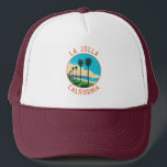La Jolla California Travel Art Vintage Trucker Hat<br><div class="desc">La Jolla in a vector art style. La Jolla, California, is a coastal gem renowned for its pristine beaches, upscale shopping, and stunning ocean views. Nestled in San Diego County, it's a charming enclave that seamlessly combines natural beauty with upscale living, making it a sought-after destination for residents and visitors...</div>