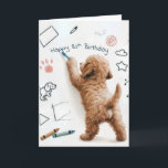 Labradoodle Doodling For 80th Birthday Card<br><div class="desc">A fluffy Labradoodle puppy is playfully drawing on a wall covered with doodles and shapes using a crayon for an 80th birthday.
The inside text can be changed.</div>