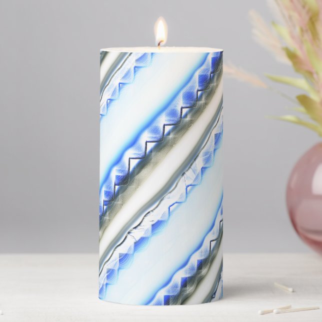 Lacelike on wide stripes in blue hue to clear gray pillar candle (In Situ)