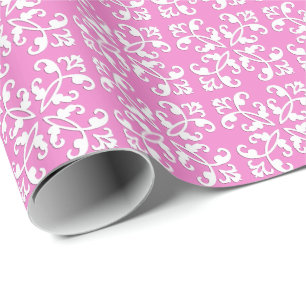 Lacy cutwork - white over orchid pink wrapping paper