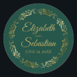 Lacy Gold Filigree Elegant Emerald Green Wedding Classic Round Sticker<br><div class="desc">These elegant wedding stickers feature fancy gold script text on an emerald green background with a lacy gold faux foil floral border. The text is fully customizable and contains the wedding couple's names and wedding date. Great as favor tags or envelope seals!</div>