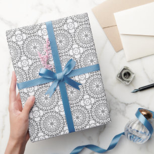 Lacy white squares on a light gray background wrapping paper
