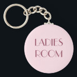Ladies restroom keyring<br><div class="desc">Keychain with a dark purple text on a pink background: Ladies room.</div>