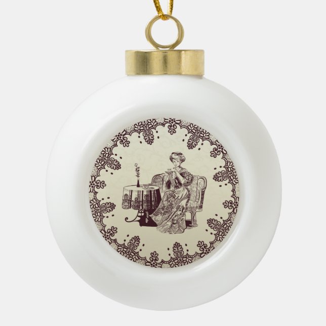 Lady drinks tea ceramic ball christmas ornament (Front)