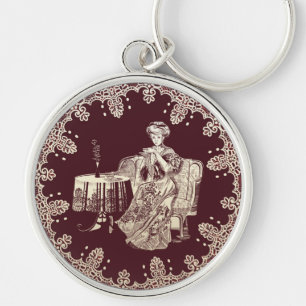 lady drinks tea keychain
