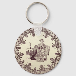 lady drinks tea keychain