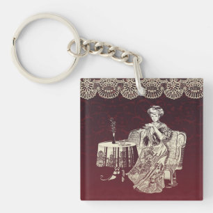 lady drinks tea keychain