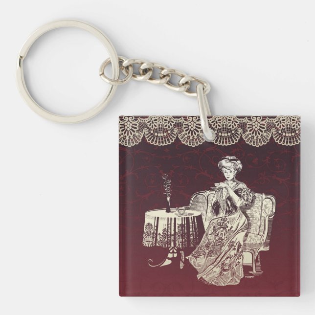 lady drinks tea keychain (Front)