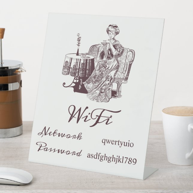 Lady drinks tea pedestal sign (In SItu)