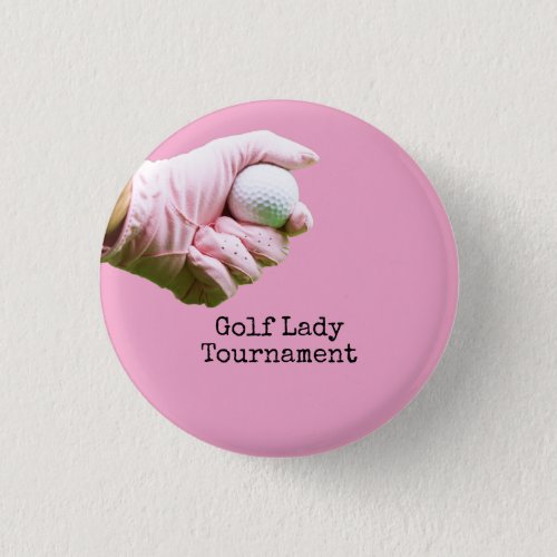 Lady golfer is holding golf ball on pinkbackground button