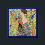 Lady with Fan by Gustav Klimt, Vintage Japonism Pinback Button<br><div class="desc">Lady with Fan (1918) by Gustav Klimt is a vintage Victorian Era Symbolism fine art portrait painting. A beautiful brunette woman holding an oriental fan. The golden floral Japanese themed background is full of blooming exotic flowers, peacocks and other birds with outstretched wings. About the artist: Gustav Klimt (1862-1918) was...</div>