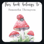 Ladybug and mushrooms - this book belongs to square sticker<br><div class="desc">"Our little ladybug is on her way!" Celebrate with this watercolor ladybug! And watercolor mushroom fly agaric! Baby shower party!
Matching items available.</div>