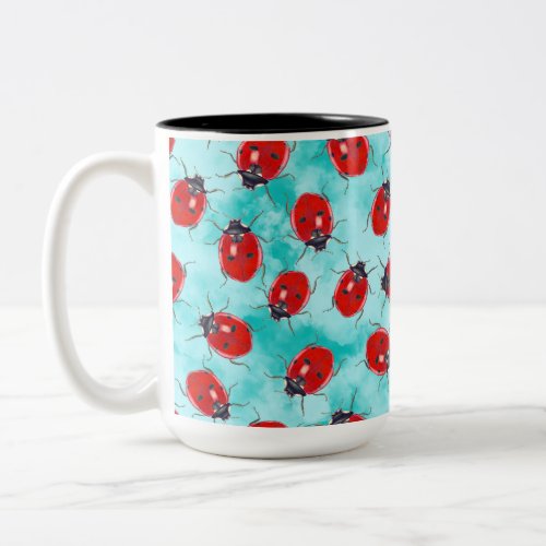 Ladybug garden friend tossed on aqua Two_Tone coffee mug
