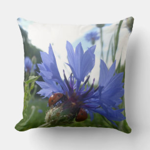 Ladybugs Meeting on Cornflower Throw Pillow