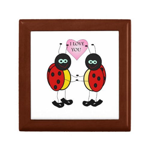 Ladybugs together holding hands in love jewelry box