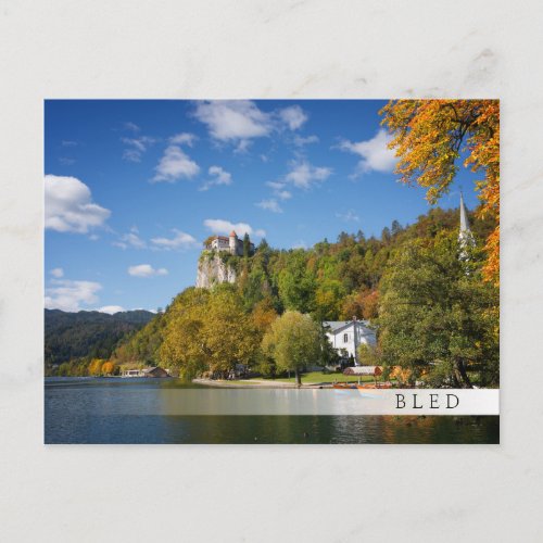 Lake Bled with trees in autumn colors in Slovenia Postcard