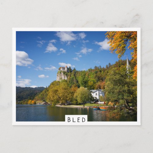 Lake Bled with trees in autumn colors in Slovenia Postcard