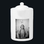 Lakota Leader Sitting Bull Native American Indian  Teapot<br><div class="desc">The iron horse screeched to a halt, spewing steam into the unfamiliar D.C. air. Sitting Bull, his weathered face etched with the wisdom of a hundred battles, stepped off, his beaded buckskins a stark contrast to the starched suits bustling around him. Though years of confinement at Fort Randall had dimmed...</div>