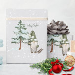Lantern Gnome Winter Scene Gift Wrapping Paper<br><div class="desc">Add cozy charm to your holiday gifting with this lantern gnome winter scene gift wrap, featuring a green-clad gnome holding a lantern beside a snow-covered tree. Snowflakes fall gently across the design, creating a whimsical winter wonderland that feels both playful and magical. Perfect for seasonal gifting, rustic packaging, or festive...</div>