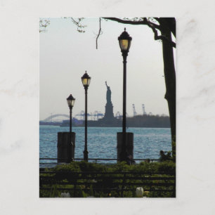 Lanterns Framing Statue of Liberty at Battery Park Postcard